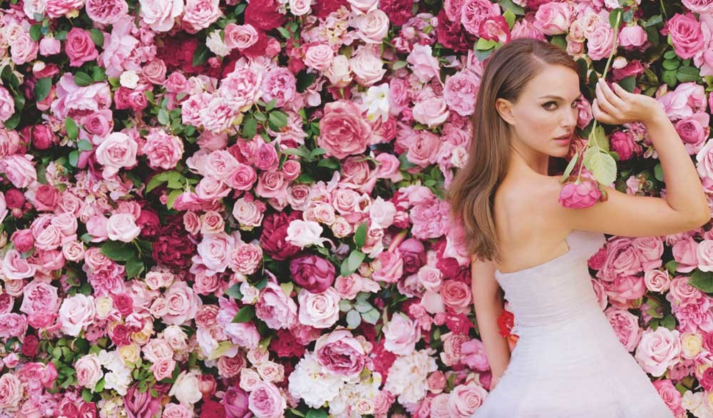 Natalie Portman is back as Miss Dior